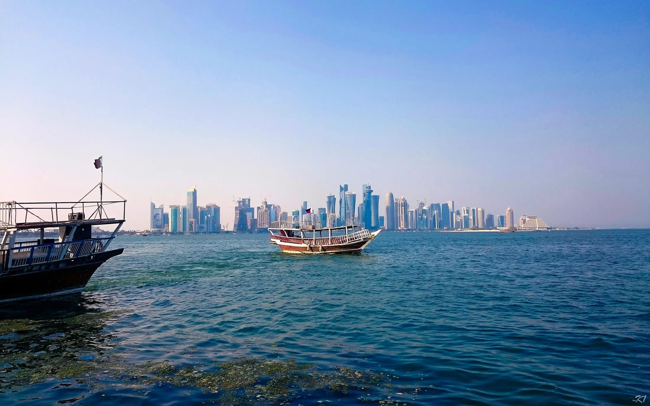 Dhow on Doha Bay with the Corniche skyline
