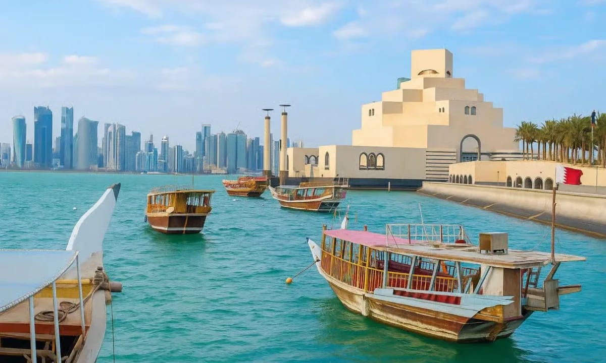 Museum of Islamic Art and traditional dhows with the Doha skyline